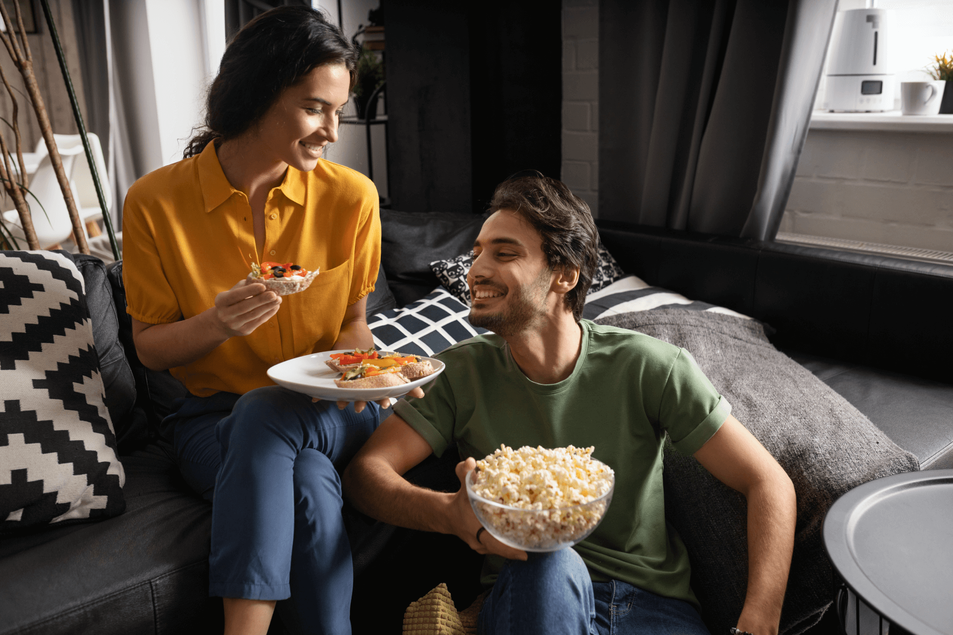 couple-eating-together-home-sofa-1 couple-eating-together-home-sofa-1